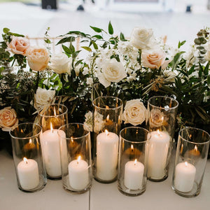 
            
                Load image into Gallery viewer, White floral table arrangement with 7 pillar candles
            
        